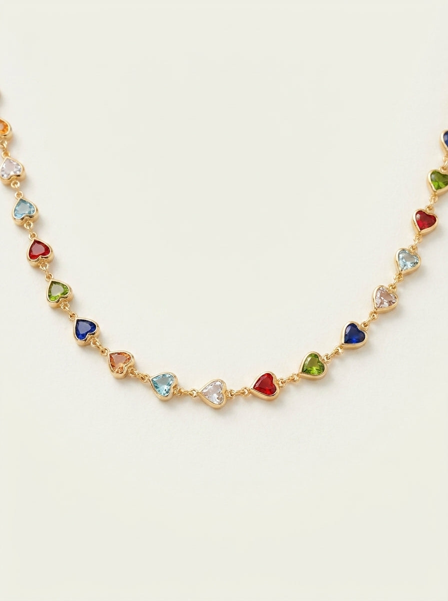 Collier de style ethnique de niche en verre avec petit cœur