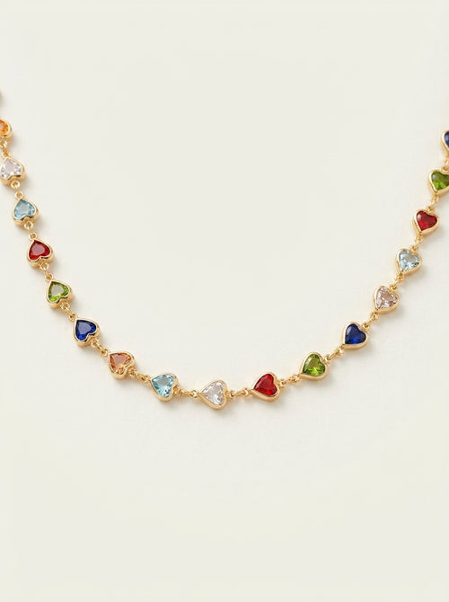 Collier de style ethnique de niche en verre avec petit cœur