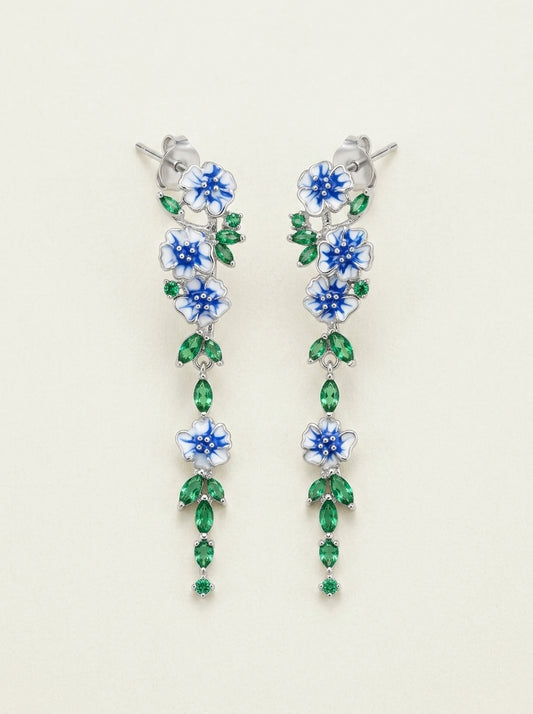 Leuchtend blaue florale Ohrhänger