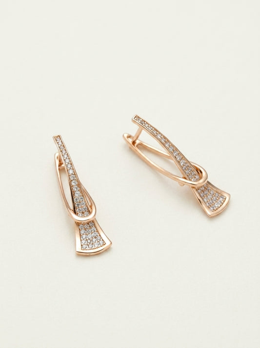 Elegante mehrlagige Ohrringe mit Glitzer