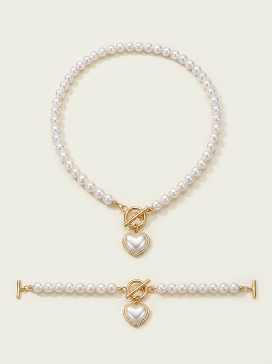 Set aus Halskette und Armband mit Herzanhänger und Perlen