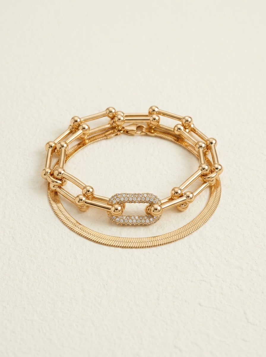 Set aus 2 Statement-Armbändern mit Vorhängeschloss und Fischgrätenmuster